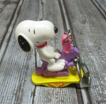 Whitmans Whitmans Peanuts Snoopy Riding a Purple Bunny Rabbit Rocker Keychain - £7.40 GBP