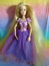 Disney Store Articulated Rapunzel Doll Dressed / No Shoes - $14.79