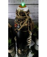 Evil Eye LED Light Decorative Potion Bottle with Skeleton Hands and Scro... - $41.40 CAD