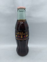 8 OZ COCA COLA COMMEMORATIVE BOTTLE - 1997 EASTER SEALS - $19.79