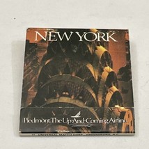 Vintage Matchbook Cover  New York  Piedmont The Up And Coming Airline  gmg - £9.89 GBP