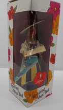 HAWAIIAN REVOLVING MUSICAL DOLL PEARLY SHELLS W/ HAT AND COLORFUL DRESS ... - $19.99
