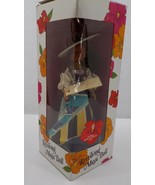 HAWAIIAN REVOLVING MUSICAL DOLL PEARLY SHELLS W/ HAT AND COLORFUL DRESS ... - £15.72 GBP