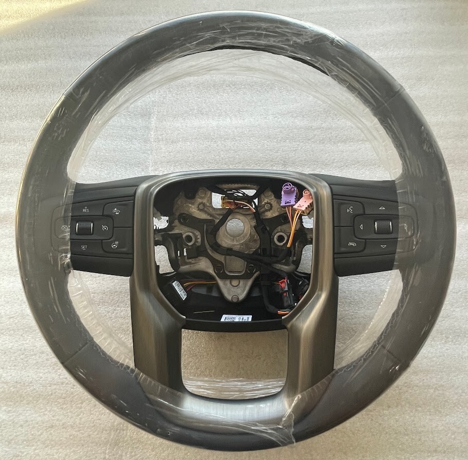 OEM Denali black leather heated steering wheel for some 2019+ Sierra trucks - $217.49