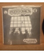 PLUTOCRACY ‘Freedom Denied’ Vinyl 7” - £59.92 GBP