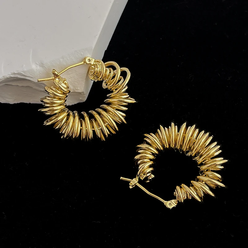 Fashion Runway Show New women&#39;s metal spring spiral earrings hollow loop gold an - £11.94 GBP