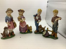 Vintage 6 Inch Resin Figurines lot of 4 figurines-dogs Chicks - $18.94