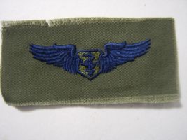 USAF FLIGHT SURGEON INSIGNIA SUBDUED (BLUE ON OLIVE)  CLOTH NEW - $3.37