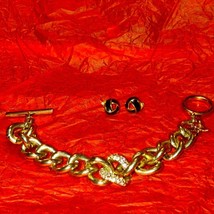 Victoria secret golden rhinestone bracelet and black and gold pair of earrings - £25.32 GBP