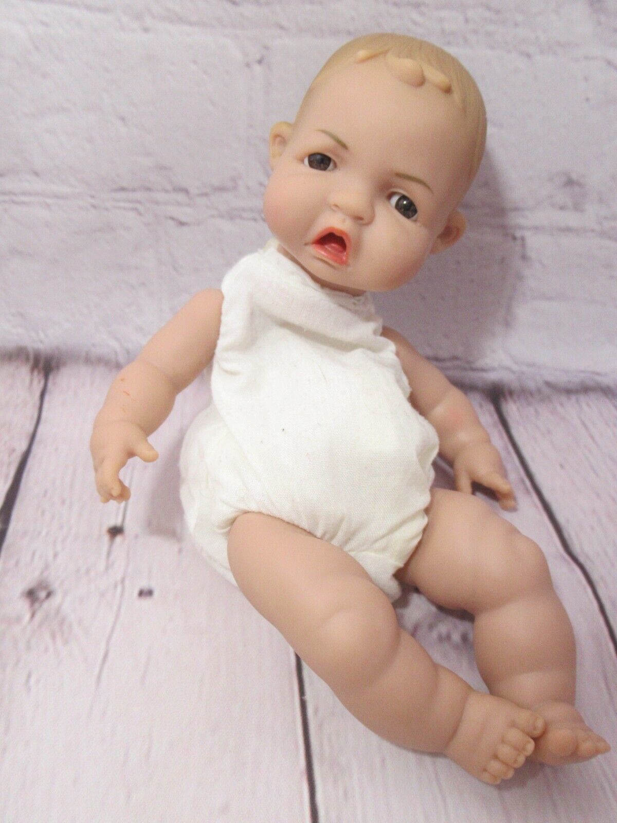 Uneeda 2003 mini baby Precious Expressions doll brown eyes fabric body 7" boy  - $8.90