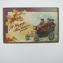 Postcard New Year Man Drives Women in Car Auto Raphael Tuck 139 Embossed... - $19.99