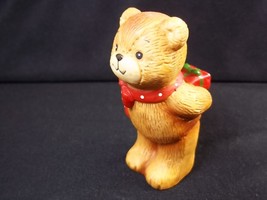 Lucy & Me bisque figurine bear with gift behind back Enesco 1978 3" tall - $5.65