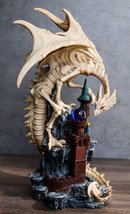 Gothic Skeleton Bone Dragon Perching On Rocky Mountain Castle Tower Figurine - £34.90 GBP