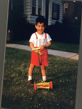 1959 photo Vintage young boy pushing toy reel lawnmower cutting grass playing - £13.38 GBP