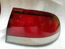 Passenger Right Tail Light Outer *Cracked* Fits 1993-1997 Mazda 626 18314 - $34.64