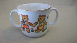 CHILDREN&#39;S CERAMIC TWO HANDLE DRINKING CUP WITH TEDDY BEAR DESIGN - £19.66 GBP