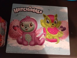 Haatchimals puzzle in a lunch tin  - $5.94