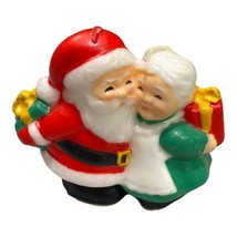 Vintage Avon Santa and Mrs Claus Exchanging Gifts Candle Unburned - $5.00