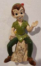 Walt Disney Productions Peter Pan 5&quot; Ceramic Figurine Japan sitting on log  - $10.31