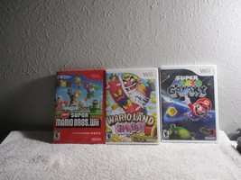 WII Mario Land shake it, Super Mario Galaxy, Super Mario Bros 3 game lot... - $57.91