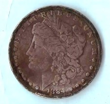 1884 O Morgan Silver Dollar - About AU50 on condition scale - Toned - 90... - $65.00
