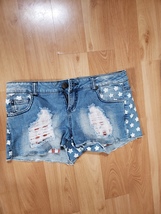 xhilaration women size 5 shorts with rips and white stars - £31.45 GBP