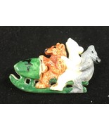 Vintage pin featuring 3 bears on a bobsled - $9.89