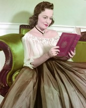 Olivia de Havilland vintage pose reading a book 24x36 Poster - $29.99