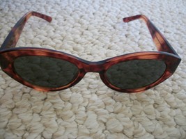  Retro Brown CE Sun-Glasses are oval shaped with brown/gray lenses (#0087) - $27.99