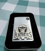Vtg NFL Oakland Raiders Silver Zippo Cigarette Lighter Football New in B... - $44.55