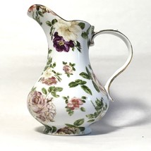 An item in the Pottery & Glass category: Royal Danube Floral Pitcher