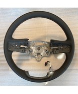 OEM original black leather steering wheel for some GMC trucks. AT4 khaki... - $1,238.04 MXN