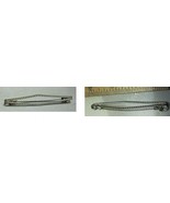 Pin # 107 silver tone elongated triangle, 11/16&quot; x 3/4&quot;. - $3.00