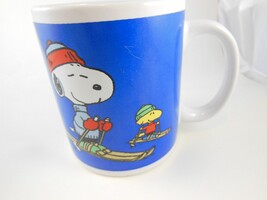 Snoopy &amp; Woodstock Skiing Mug Cup United Features Syndicate Vintage - $8.31