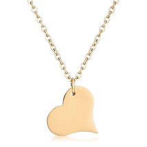 Goldtone Heart Pendant - $440.07 MXN