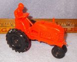Vintage Barr Ohio Orangie Red  Plastic Rubber Tractor with Farmer Driver  - $7.95