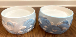 Dolphin waves round pillar candle holders ceramic set of two. - $24.75