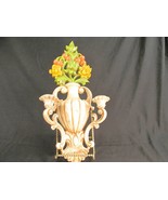 Double candle wall sconces with urn and flower design - $566.34 MXN