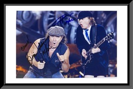AC/DC Brian Johnson and Angus Young signed photo - £394.68 GBP