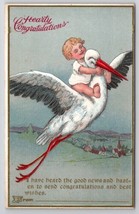Baby Riding Stork Flying Above Town Postcard B44 - £5.54 GBP