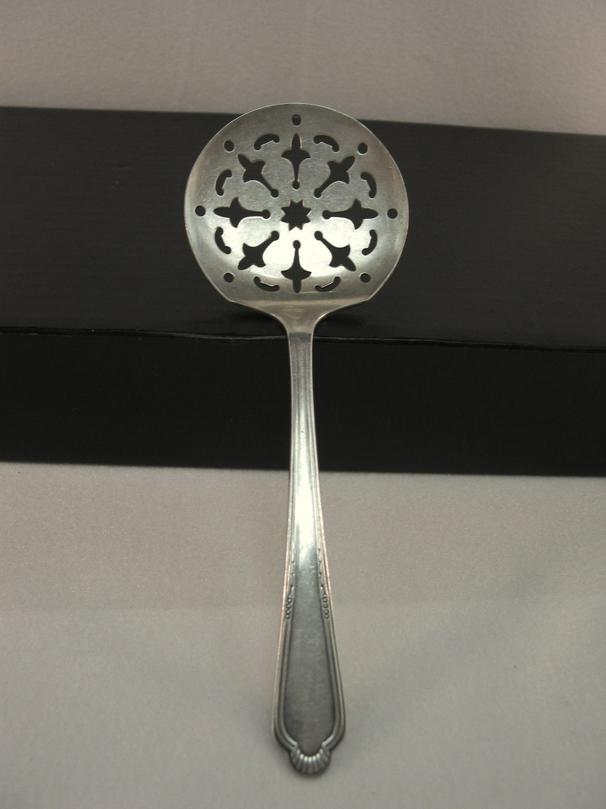Primary image for Wm Rogers Tomato Server Spoon Laurel or Helena c1954 Silver Plate Pierced