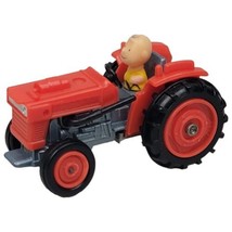 Vintage Charlie Brown Aviva Kubota Tractor 21/4&quot; United Feature Syndicat... - £14.70 GBP