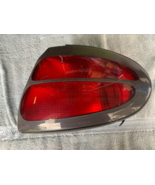 00 01 02 03 04 05 FORD TAURUS Right/Passenger TAILLIGHT SW QUARTER PANEL... - $60.50 CAD