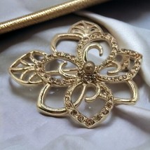 Monet Goldtone and crystal flower brooch, - £22.57 GBP