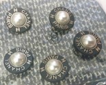 Chanel Button 23 mm stamped Black metal pearl - $23.00