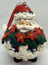 Vintage Traditions Collectible Santa Carrying Poinsettias Glass Ornament - £11.88 GBP