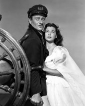 John Wayne and Gail Russell in Wake of the Red Witch posing by wheel 16x20 Canva - £55.29 GBP