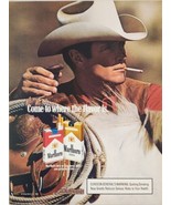 1986 Print Ad Marlboro Cigarettes Rugged Cowboy Smoking &amp; Rope, Saddle - £15.23 GBP