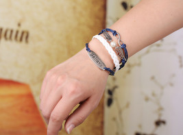 Silver Plated Believe Angel Infinity Blue Leather Cord Charms Bracelet 6... - $2.94
