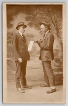 RPPC Two Dapper Gents Men Smoking Suits Hats Studio Props Postcard G29 - £14.84 GBP
